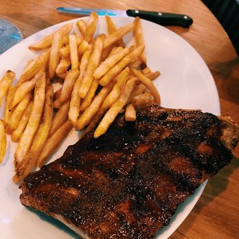 BJ's Restaurant & Brewhouse - Half Rack of Baby Back Pork Ribs, Fries - New American Near Me - Melbourne, Florida
