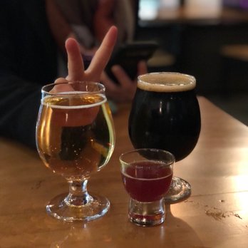 Tomorrow's Verse - two glasses of beer on a table - Beer Bar Near Me - Portland, Oregon Tomorrow's Verse - two glasses of beer on a table - Beer Bar Near Me - Portland, Oregon