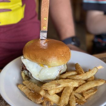 Pub Americana - Hangover burger - applewood smoked bacon, fried egg, Monterey Jack cheese, avocado relish and tomato. - Bars Near Me - Cocoa, Florida Pub Americana - Hangover burger - applewood smoked bacon, fried egg, Monterey Jack cheese, avocado relish and tomato. - Bars Near Me - Cocoa, Florida