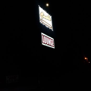 98 West Package & Lounge - a sign at night - Lounges Near Me - Mary Esther, Florida 98 West Package & Lounge - a sign at night - Lounges Near Me - Mary Esther, Florida