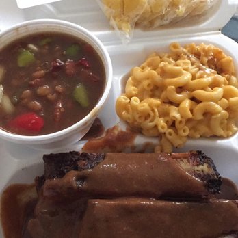 Showcase BBQ - Half slab of ribs with mac and cheese and baked beans. - Barbeque Near Me - Pittsburgh, Pennsylvania Showcase BBQ - Half slab of ribs with mac and cheese and baked beans. - Barbeque Near Me - Pittsburgh, Pennsylvania