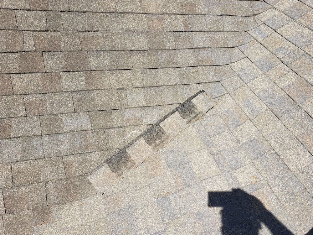 Slide of RainTight Roofing