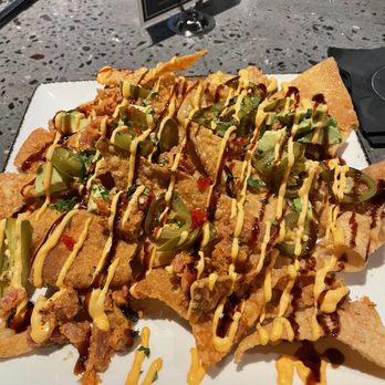 Tommy's Tavern Tap - Sushi nachos. Chips were a little too big and wish the sushi wasn't minced - New American Near Me - Mount Laurel Township, New Jersey