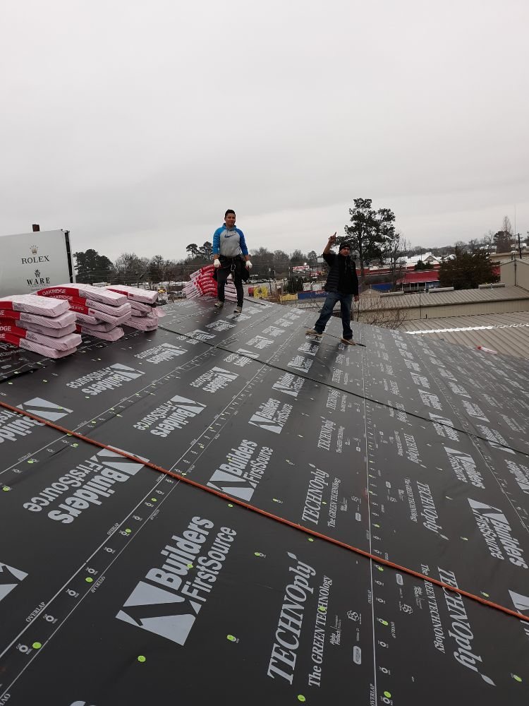 Slide of Ram's Roofing Service