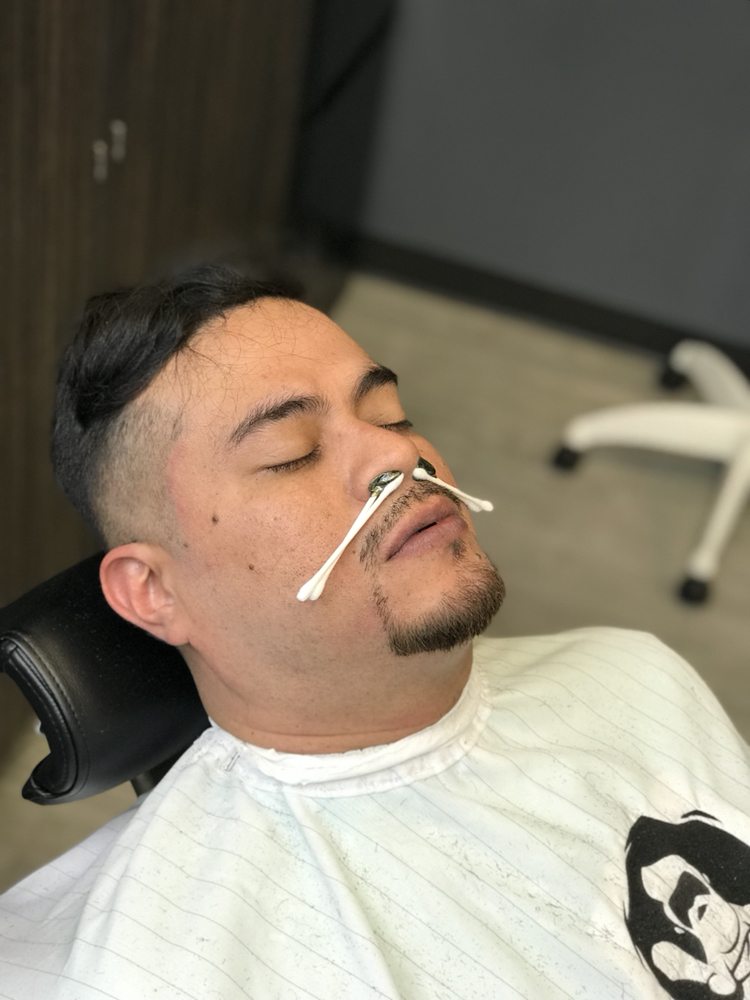 Dummy Duckin Barber Studio Logo