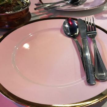 Punjabi Tadka - a plate with a fork and spoon on it - Indian Near Me - Brampton, Ontario Punjabi Tadka - a plate with a fork and spoon on it - Indian Near Me - Brampton, Ontario