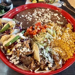 Guadalajara Grill and Cantina - Carnitas taco, fish taco, Rice and beans
