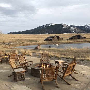Sage Lodge - Firepits outside with the 6 bedroom ranch houses just beyond the pond - Hotels Near Me - Pray, Montana Sage Lodge - Firepits outside with the 6 bedroom ranch houses just beyond the pond - Hotels Near Me - Pray, Montana