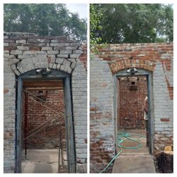 Masonry Restoration By Benny - We turned these loose bricks back into a doorway by rebuilding the arched brick header over the door. We also rebuilt the brick parapet