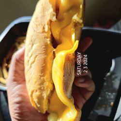 Pardon My Cheesesteak - Side view of chicken cheese steak Chipotle.