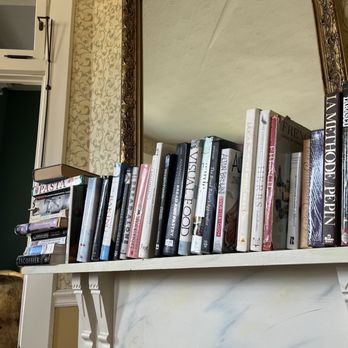 Screen Door Kitchen - a fireplace with books on it - Breakfast & Brunch Near Me - Dayton, Tennessee Screen Door Kitchen - a fireplace with books on it - Breakfast & Brunch Near Me - Dayton, Tennessee
