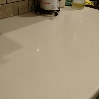 Dillabaugh's Flooring America - Dark tinted seams on off-white quartz countertops. This is the "Industry standard" you will get. - Flooring Near Me - Boise, Idaho Dillabaugh's Flooring America - Dark tinted seams on off-white quartz countertops. This is the "Industry standard" you will get. - Flooring Near Me - Boise, Idaho