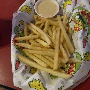 The Chop Shop - Side of fries. Came with queso to dip. - Burgers Near Me - Lakeland, Florida The Chop Shop - Side of fries. Came with queso to dip. - Burgers Near Me - Lakeland, Florida