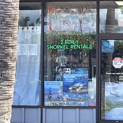 2 for 1 rental sign at shop and all over island.