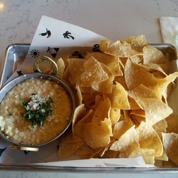 Diego Pops - The street corn queso has fresh grilled corn in it and the cheese is melted assortment of delicious flavors and half off during happy hour - Cocktail Bars Near Me - Scottsdale, Arizona Diego Pops - The street corn queso has fresh grilled corn in it and the cheese is melted assortment of delicious flavors and half off during happy hour - Cocktail Bars Near Me - Scottsdale, Arizona