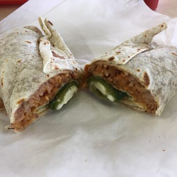 Paco's - Bandito Burrito (chili relleno, Spanish rice, and refried beans) - Mexican Near Me - Tucson, Arizona Paco's - Bandito Burrito (chili relleno, Spanish rice, and refried beans) - Mexican Near Me - Tucson, Arizona