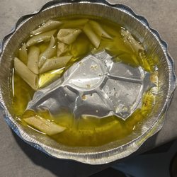 Italian Bistro - Took my wife to this "Italian Bistro" and this is what she got. Had to try and fish out the noodles to put them in a separate bowl. Terrible
