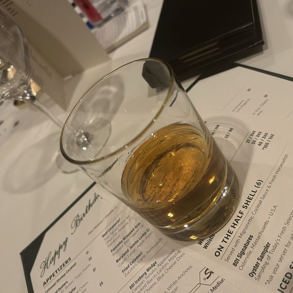 801 Chophouse - 2 finger pour of Blantons bourbon whiskey - Steakhouses Near Me - Clayton, Missouri
