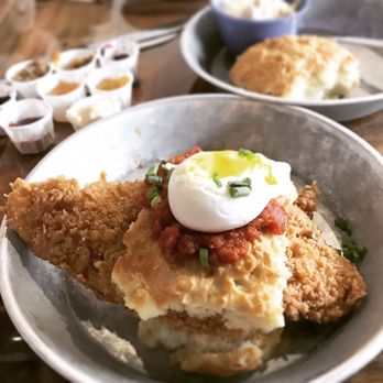Biscuit Head - Fried catfish biscuit with tomato, slaw, creole gravy, and a poached egg  Jams from the jam bar  Plain biscuit  Pimento cheese grits - Breakfast & Brunch Near Me - Greenville, South Carolina