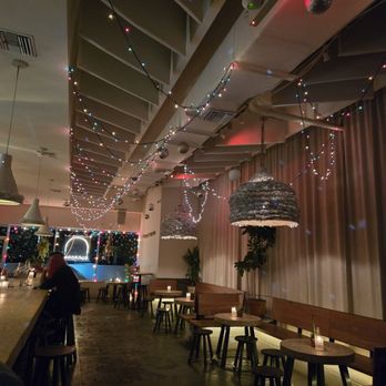 Sunroom - This was the vibe during the holidays! I'm a sucker for any Christmas lights - Cocktail Bars Near Me - Orlando, Florida