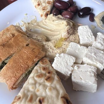Cosmos Café - Sampler appetizer plate was so good, we forgot to take a picture before we dug in. - Greek Near Me - Wauwatosa, Wisconsin Cosmos Café - Sampler appetizer plate was so good, we forgot to take a picture before we dug in. - Greek Near Me - Wauwatosa, Wisconsin