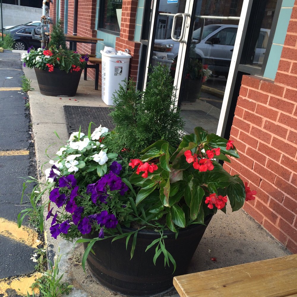 Tables and Flowers outside. Seating and Beverages inside. Perfect! Tables and Flowers outside. Seating and Beverages inside. Perfect!