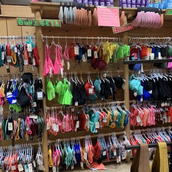 Beachcomber's - Rack at other end of wall with sign over 6-feet high that no one would see. - Sports Wear Near Me - Lake Havasu City, Arizona Beachcomber's - Rack at other end of wall with sign over 6-feet high that no one would see. - Sports Wear Near Me - Lake Havasu City, Arizona