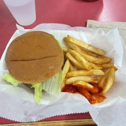 Turkey Run Gas and Grill - A Burger with partially eaten fries for roughly $8.00.
