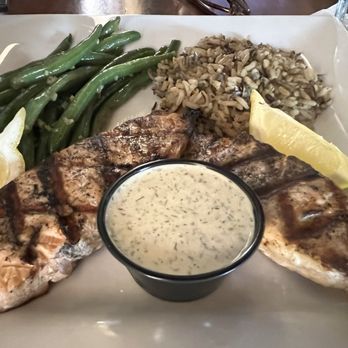 ParkShore Lounge - Salmon dinner with a creamy dill sauce, wild rice and green beans. - New American Near Me - Traverse City, Michigan ParkShore Lounge - Salmon dinner with a creamy dill sauce, wild rice and green beans. - New American Near Me - Traverse City, Michigan