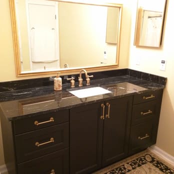 New Concepts Construction - Bathroom vanity using Ikea cabinets and faucet installation - General Contractors Near Me