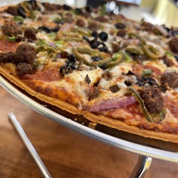 Piara Pizza - a thin crust pizza with various toppings - Pizza Near Me - Hemet, California