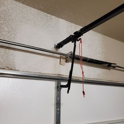 This photo is the reinstall of the garage door. Notice the small bracket.
