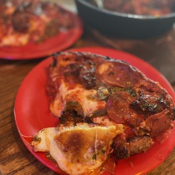 Pequod's Pizza - Small size pan pizza (6 slices) is enough for 2 ppl. That caramelized cheesy crust is out of this world! - Pizza Near Me - Chicago, Illinois Pequod's Pizza - Small size pan pizza (6 slices) is enough for 2 ppl. That caramelized cheesy crust is out of this world! - Pizza Near Me - Chicago, Illinois