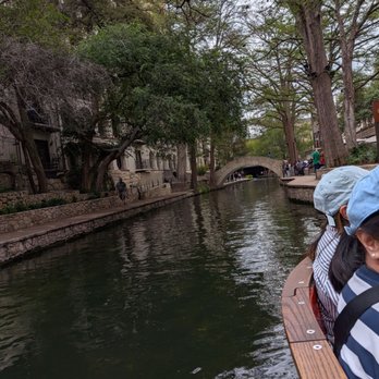 San Antonio River Walk - View of the river walk and San Antonio river from a tour boat. - Tours Near Me San Antonio River Walk - View of the river walk and San Antonio river from a tour boat. - Tours Near Me
