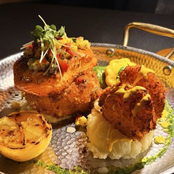 The Palms - Salmon over a fried risotto cake, with prawns, sautéed veggies and mashed potatoes. - Seafood Near Me - Fresno, California The Palms - Salmon over a fried risotto cake, with prawns, sautéed veggies and mashed potatoes. - Seafood Near Me - Fresno, California