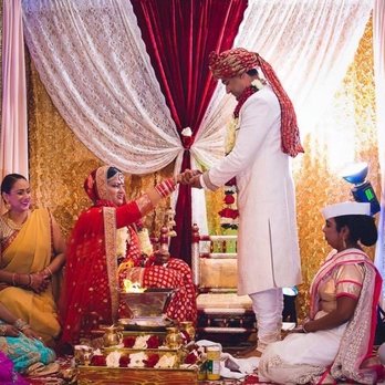 Royal Elite Events - Count the colors of curtains: white, bronze, pink, gold, red, yellow, more gold.....tacky as can be. - Party & Event Planning Near Me - Richmond Hill, New York