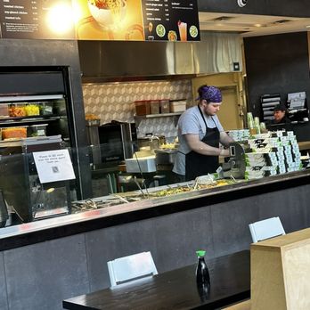 FUSIAN - a man preparing food in a restaurant - Sushi Bars Near Me - Columbus, Ohio FUSIAN - a man preparing food in a restaurant - Sushi Bars Near Me - Columbus, Ohio