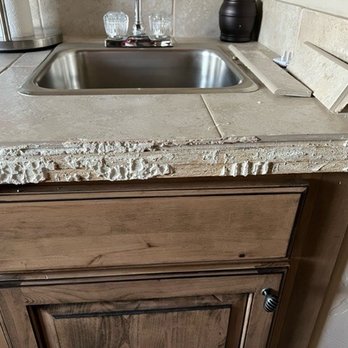Vacasa - Broken tile on wet bar - Vacation Rentals Near Me Vacasa - Broken tile on wet bar - Vacation Rentals Near Me