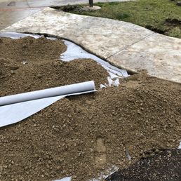 Progress with a barrier and some top dressing.