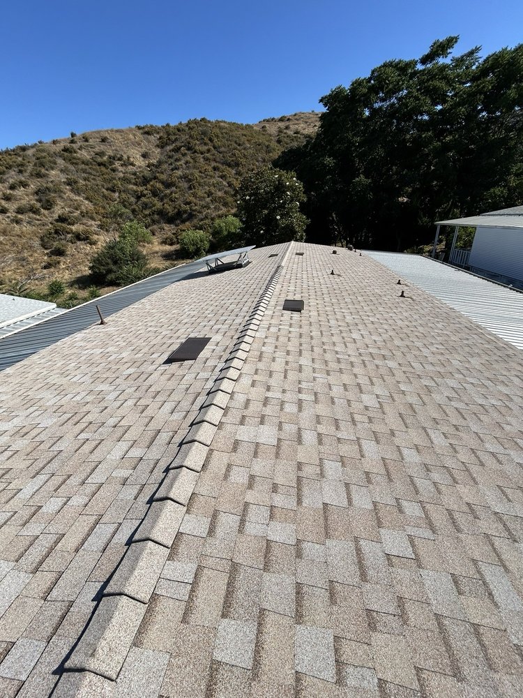 Slide of Manna Roofing Company