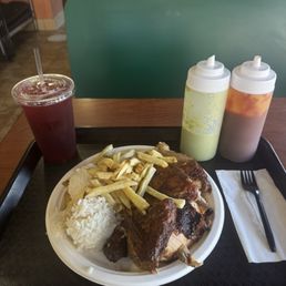 Chicken with rice and fries, and Chicha Morada Chicken with rice and fries, and Chicha Morada