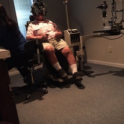 Carolina Eye Associates - Dad getting eye exam