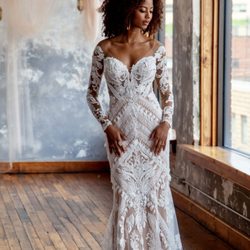 The Bridal Manor - Beautiful boho lace column gown with architectural figure flattering lines by All Who Wander.