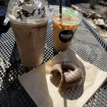 Khairos Coffee - Coffee and blueberry glazed doughnut - Coffee & Tea Near Me - Clarksville, Tennessee Khairos Coffee - Coffee and blueberry glazed doughnut - Coffee & Tea Near Me - Clarksville, Tennessee