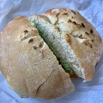 Rego Bagels - bialy with garlic & herb spread - Bagels Near Me - Rego Park, New York Rego Bagels - bialy with garlic & herb spread - Bagels Near Me - Rego Park, New York