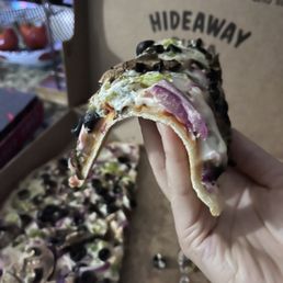Undercooked thin crust veggie pizza