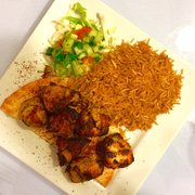 Photo of Zara Afghan Cuisine - Sacramento, CA, United States. Chicken kabob over rice