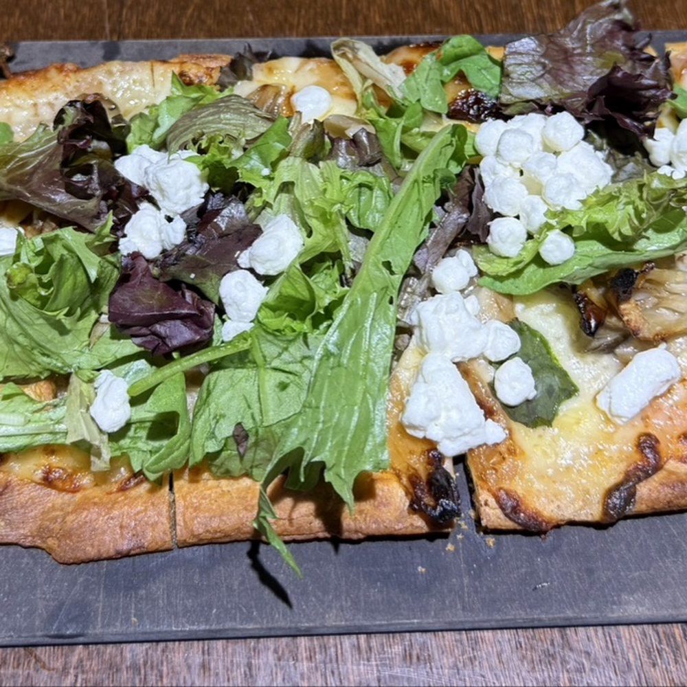 Wild Mushroom Flatbread with caramelized onions, goat cheese and arugula Wild Mushroom Flatbread with caramelized onions, goat cheese and arugula