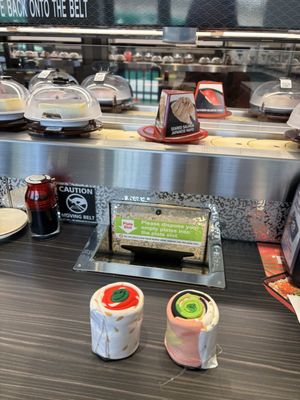 Kura Revolving Sushi Bar by null