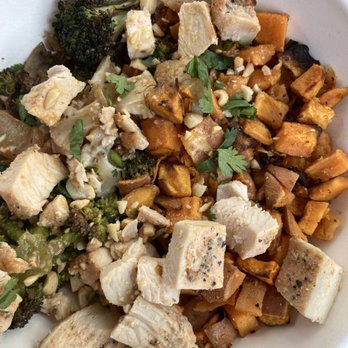 Original ChopShop - Thai Coconut Chicken Bowl GF. The employee suggested on a bed sweet potato and it was a great option. - Salad Near Me - Mckinney, Texas Original ChopShop - Thai Coconut Chicken Bowl GF. The employee suggested on a bed sweet potato and it was a great option. - Salad Near Me - Mckinney, Texas